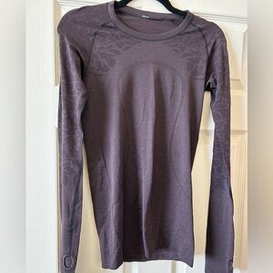 Lululemon Swiftly, size 6, great condition. Purple & black